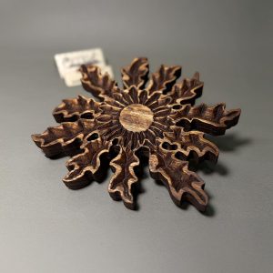 Eguzkilore Mediano Bajorrelieve